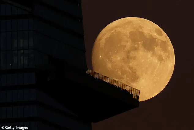 Stargazer's Delight: The Harvest Moon's Supermoon Spectacle Illuminates the Night Sky