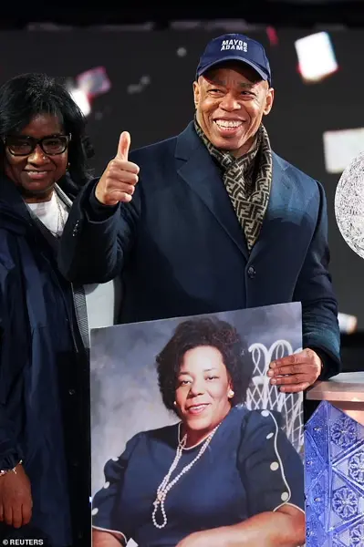 Thousands Gather in Times Square for New Year's Eve Celebration as 2025 Begins
