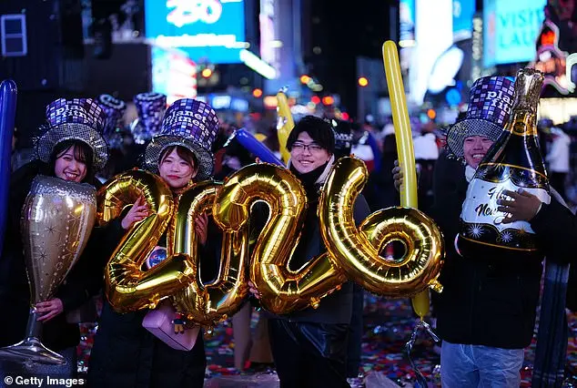 Thousands Gather in Times Square for New Year's Eve Celebration as 2025 Begins