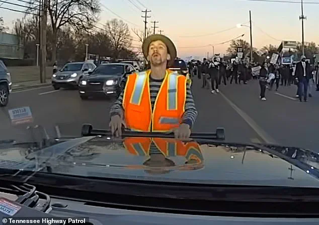 Dashboard Footage Contradicts Claims of Protester Being Struck in Memphis, Showing Activist Grabbing Police Vehicle
