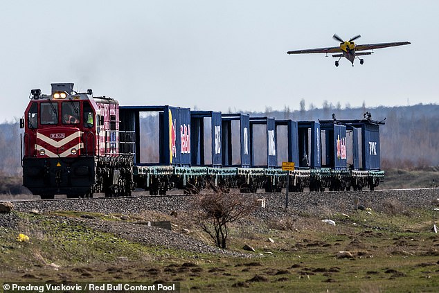 Daring Feat: Pilot Lands Plane on Moving Train at 75mph in World-First Stunt