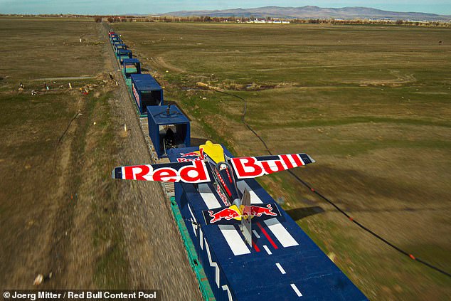 Daring Feat: Pilot Lands Plane on Moving Train at 75mph in World-First Stunt