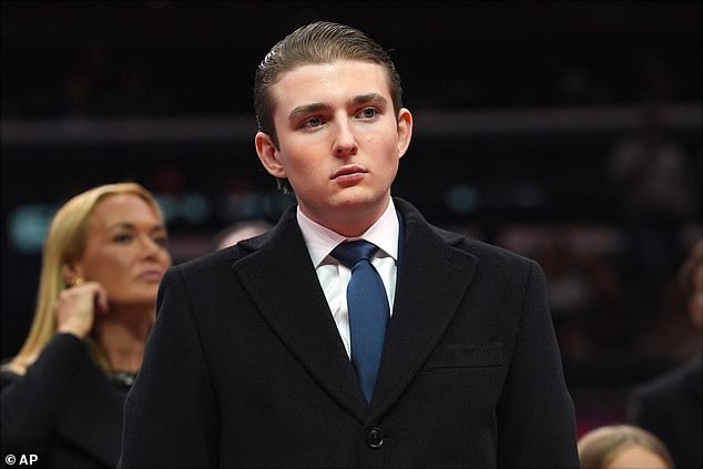 Barron Trump Surprises at State of the Union with Blue Tie, Contrasting Family's Red