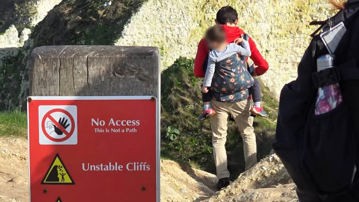 Father's Reckless Decision to Carry Child on Perilous Cliff Path at Old Harry Rocks Ignites Safety Concerns Despite 'No Access' Warnings