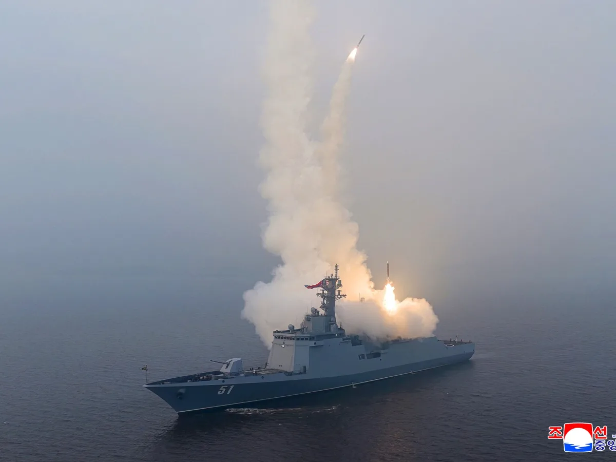 North Korea's Kim Jong Un personally oversees strategic missile test from new naval destroyer, underscoring military ambitions and political message