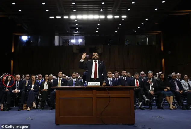 Trump's FBI nominee Kash Patel has a supportive crowd at his Senate confirmation hearing, including his girlfriend, country music artist Alexis Wilkins.