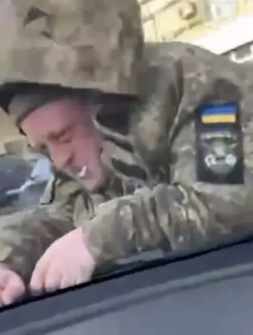 TEC Dnipropetrovsk Comments on Shocking Video of Employee Riding Moving Car During Patrol