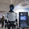 Elon Musk's Optimus Robot Showcase Sparks Controversy as Grok AI Casts Doubt on Practicality